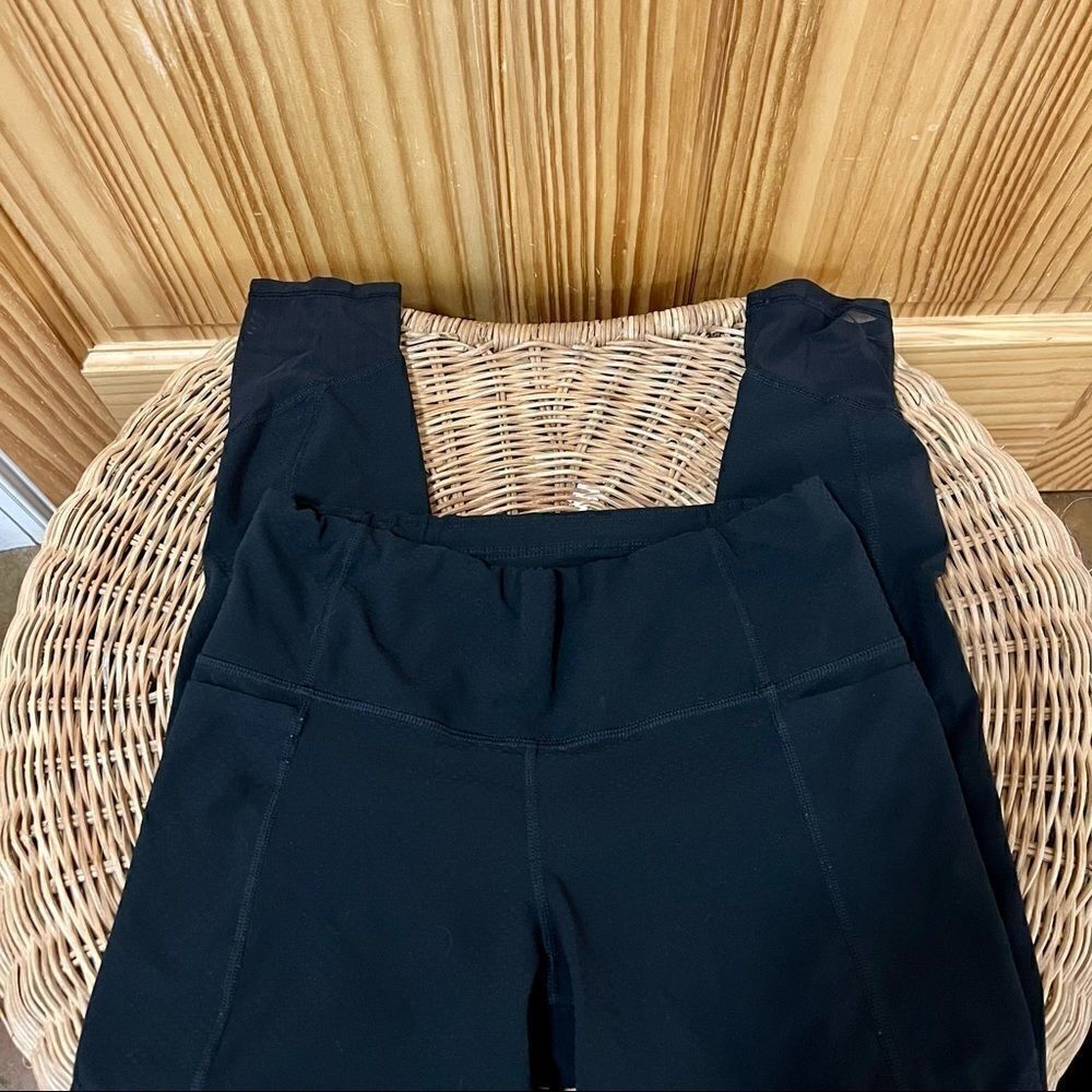 Athleta black cropped crop sheer mesh detail w pockets workout leggings pants XS